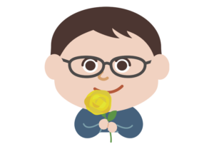 黄色いバラを持つ男性