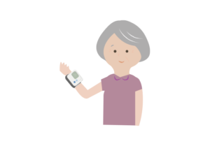 血圧測定する年配の女性