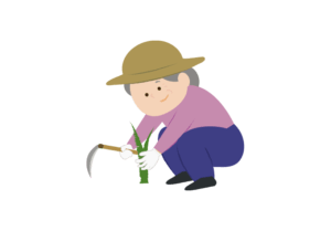 草刈りをする年配の女性