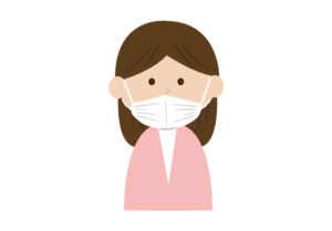 鼻が出ているマスク姿の女性