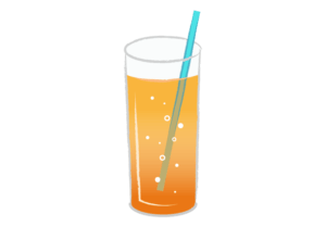 オレンジソーダを注いだコップとストロー